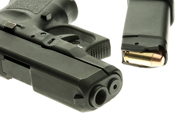 istock Handgun and full clip 155099468
