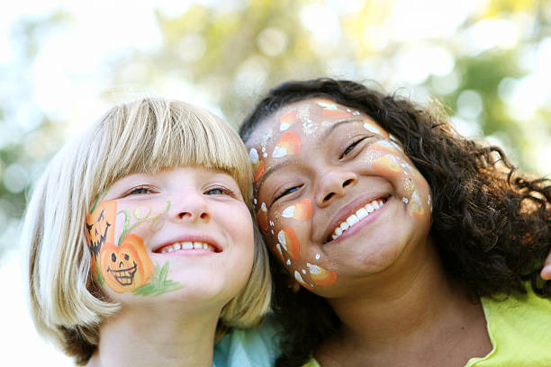 Face painted kids face painted kids face paint stock pictures, royalty-free photos & images