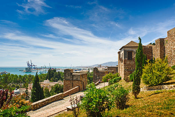 La Alcazaba, Malaga city, Spain View of the Harbor of Malaga city from the "Alcazaba". D3x, Nikkor Lens 14/24mm f2.8. in RAW mode, and post-processed in "LR" and/or "PS" at 16 bits color deep alcazaba of málaga stock pictures, royalty-free photos & images