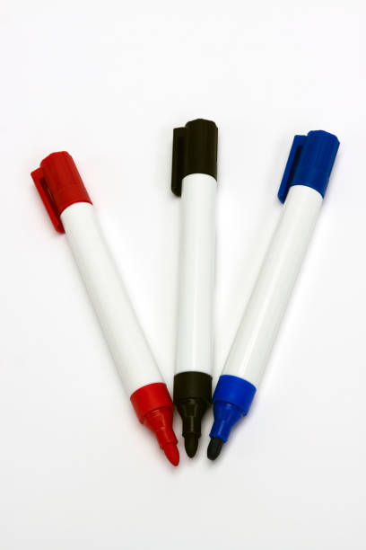 istock Whiteboard markers red, black and blue against white background 155099677