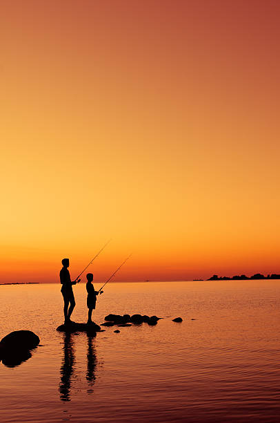 istock Boys Are Fishing At Sunset - II 155099715