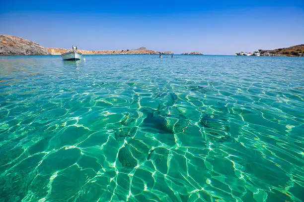 crystal clear waters on the beach of Lindos, Rhodes Island, Dodecanese, Greece.