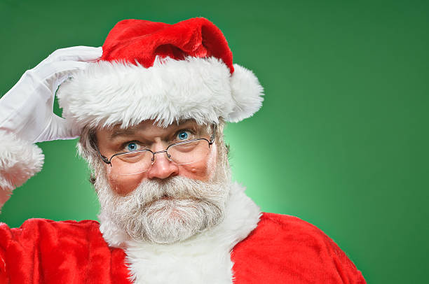 Confused Santa Claus stock photo
