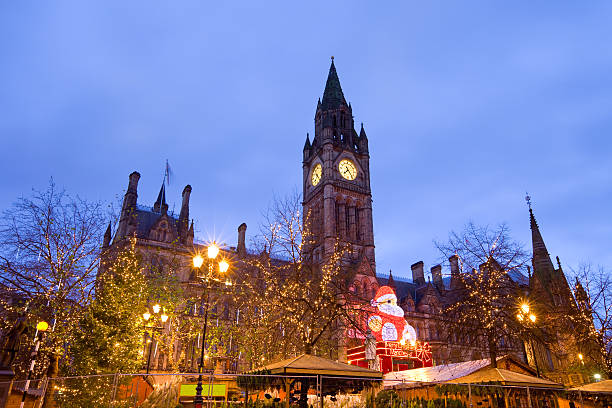 Manchester, England, UK, Christmas Market Christmas Market on Albert Square in front of the Town Hall, Manchester, England. manchester england stock pictures, royalty-free photos & images