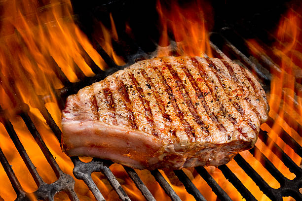 istock Ribeye Steak on Grill with Fire 155100061
