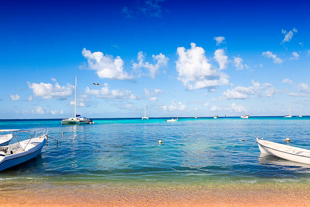 istock Tranquill tropical island beach with boats. 155100154