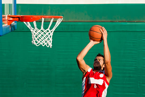 jump shot - high schooler foto e immagini stock