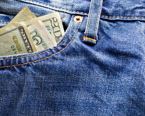 Cash in Pocket Close up of cash in pants pocket. pickpocketing stock pictures, royalty-free photos & images