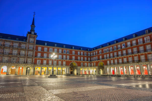 istock Madrid Spain, night city skyline at Plaza Mayor 1551030327