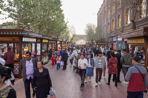 Kashgar, Xinjiang, China -april 23, 2023:There are market stalls on the streets of Kashgar Old Town, and there are many restaurants here mainly at night, offering various Xinjiang foods