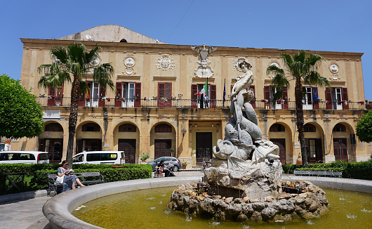 Monreale, Italy - May 26, 2023: Fountain Triton at Piazza Vittorio Emanuele in Monreale, Sicily, Italy