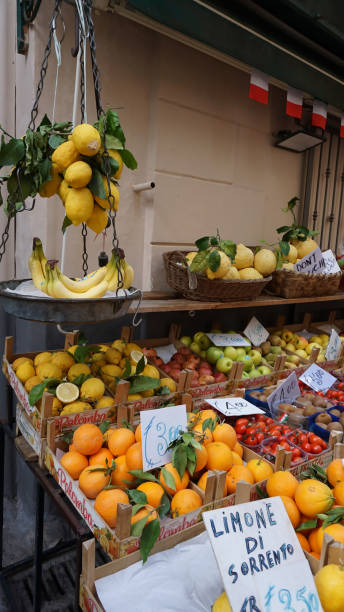 The tourist shop that sells citrus based goods and souvenirs such as the Limoncello liquor in the streets of Sorrento Sorrento, Italy - May 23, 2023: The tourist shop that sells citrus based goods and souvenirs such as the Limoncello liquor in the streets of Sorrento old town near Napoly amalfi food stock pictures, royalty-free photos & images