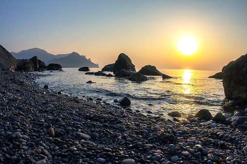 Sunrise and sunset on the stone seashore. landscape in nature