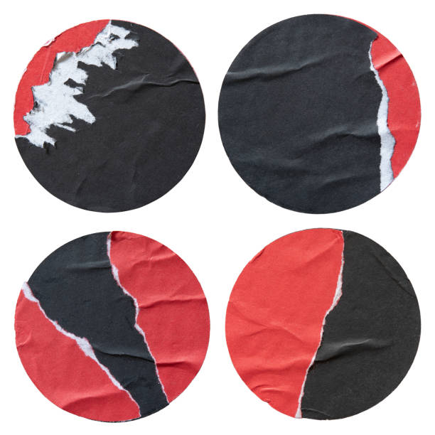 istock Torn round red and black paper stickers 1551156230