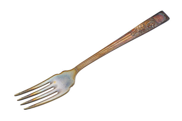 Old oxidized metal fork, cut out, photo stacking