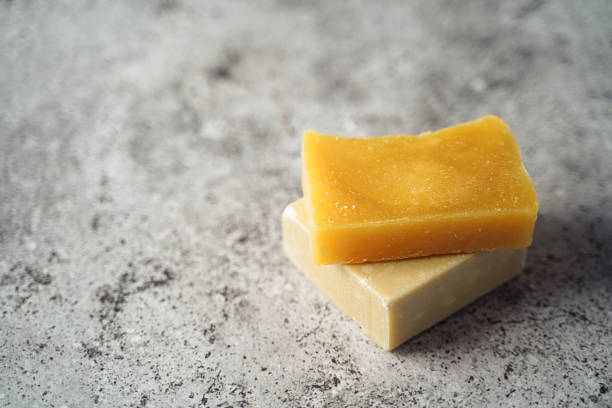 istock Goat Soap over gray background. Zero waste, natural organic bathroom tools. Plastic free life. Ecological skin care, body treatment concept. 1551198259