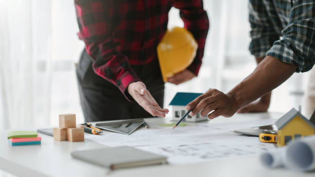 istock Creative Engineer and Architect Meeting for Collaborative Design and Project Planning in the Workplace. 1551209287