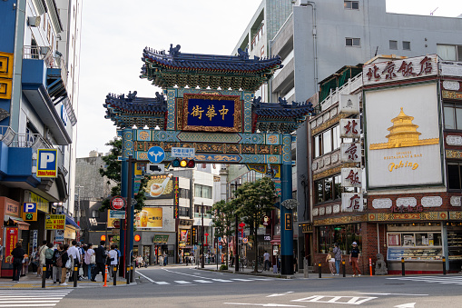 Yokohama, Japan - June 29, 2023 : People at the Yokohama Chinatown in Yokohama, Japan. It is Japan's largest Chinatown and one of the most popular tourist destinations in Yokohama, with many Chinese stores and restaurants on the narrow and colorful streets.