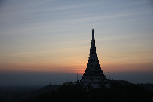Silhouette Pagoda on top of mountain during sunset,Khao wang Historical Park Pranakornkhiri mountain, Petchaburi province, Thailand