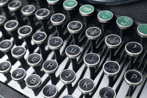 Close up view of an old typewriter keys. Selective focus