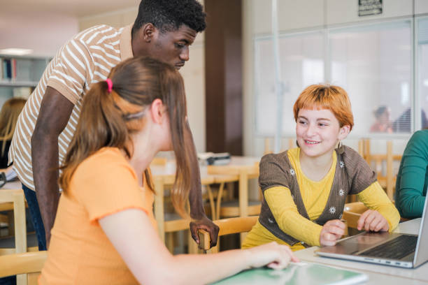 istock College students of different ethnicities studying together in the university library 1551215143