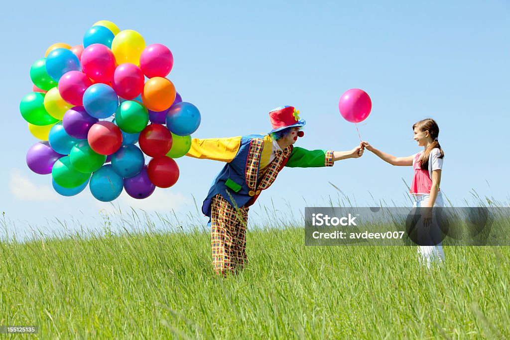 Clown e ragazza - Foto stock royalty-free di Clown