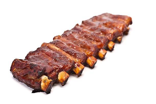 Barbeque Pork Ribs on a white background\n\n\nFind Similar Images in my Lightboxes\n\n[url=http://www.istockphoto.com/search/lightbox/7812277#182aec2][img] http://mgillowphotography.co.uk/Stock_Page/istock_links/meat.jpg[/img][/url]\n