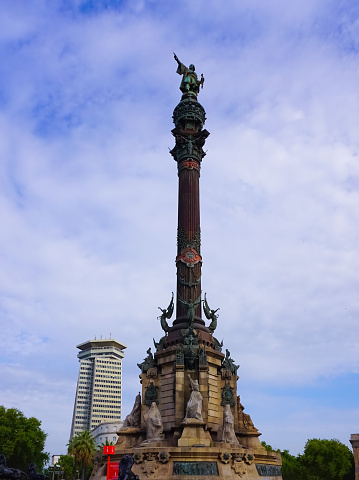 The monument of Christopher Columbus in Barcelona, is a 60 meters high column, It was put up for the universal exposition of 1888 in homage to the famous explorer. isolated on blue sky