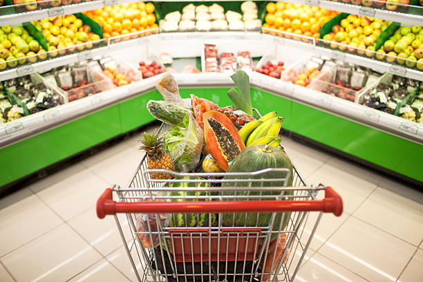 istock Supermarket car full with fruit and vegetables 155127371