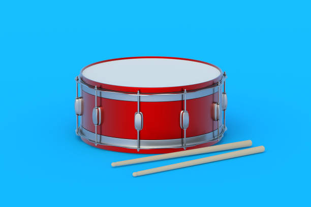 istock Drum near drumsticks on blue background. Percussion musical instrument. 3d render 1551275867