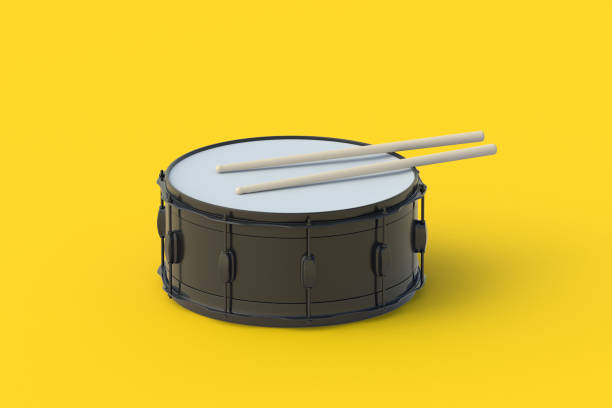istock Drum with drumsticks on orange background. Percussion musical instrument. 3d render 1551275871