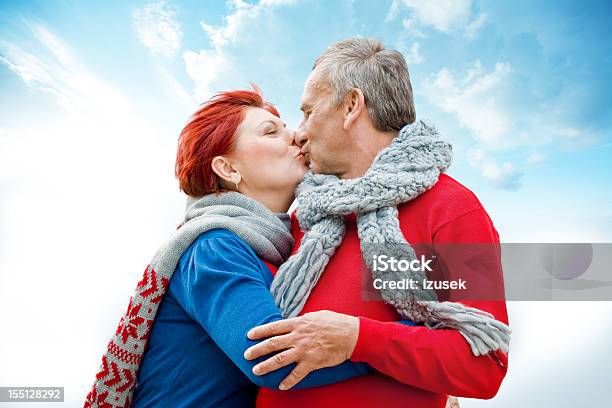 Loving Seniors Outdoor Portrait Stock Photo - Download Image Now - Blue, Candid, Sky