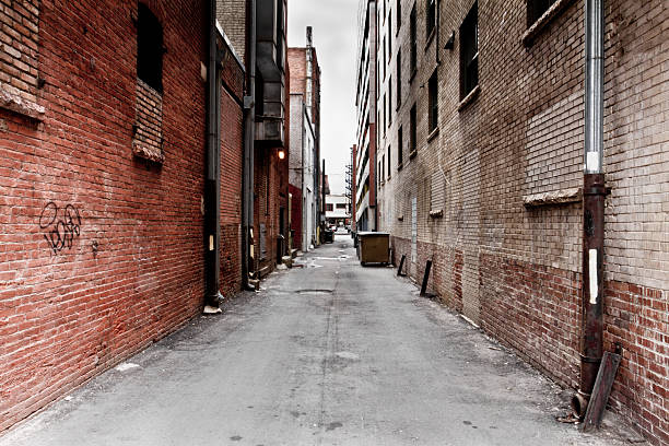Dark Grungy Alley Dark Grungy Alley in a big city alley stock pictures, royalty-free photos & images