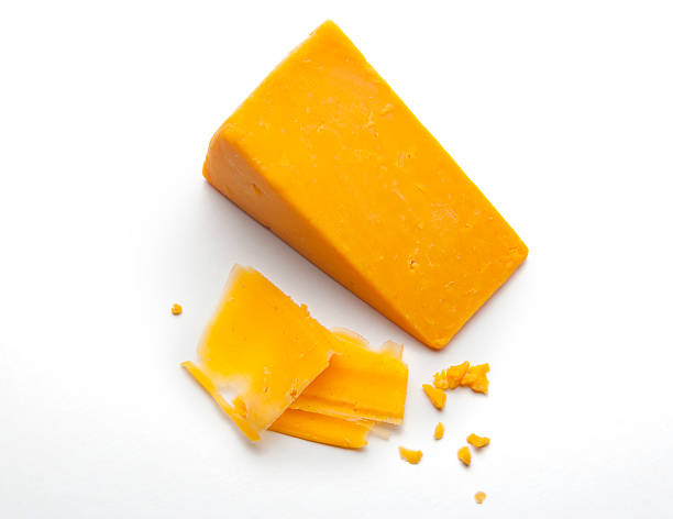 blocco di formaggio cheddar - affilato foto e immagini stock