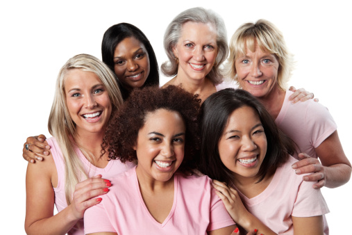 Feliz, diverso grupo de mujeres en rosa photo