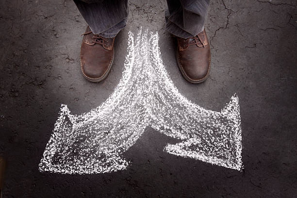 Standing Man with Two Choices (business) stock photo