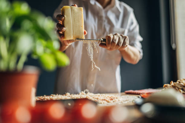istock A woman prepares a pizza 1551319581