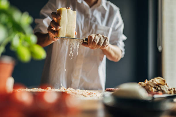 istock A woman prepares a pizza 1551320601