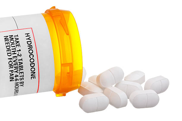 rótulo do frasco do medicamento com comprimidos e hidrocodona - hydrocodone imagens e fotografias de stock