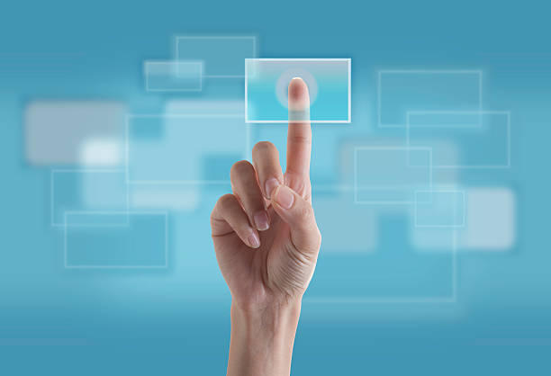 Finger Touching Transparent Digital Touch Screen stock photo