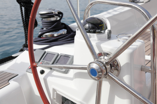 sailing ship cockpit and steering wheel