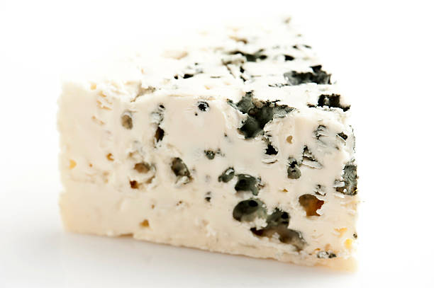Piece of French Roquefort Cheese  roquefort cheese stock pictures, royalty-free photos & images