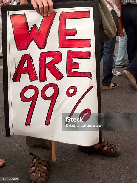 Estamos 99 Foto de stock y más banco de imágenes de Anti-capitalismo - Anti-capitalismo, Primavera árabe, 80-89 años