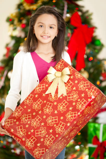 istock Young Hispanic Girl & Christmas Gifts 155132996