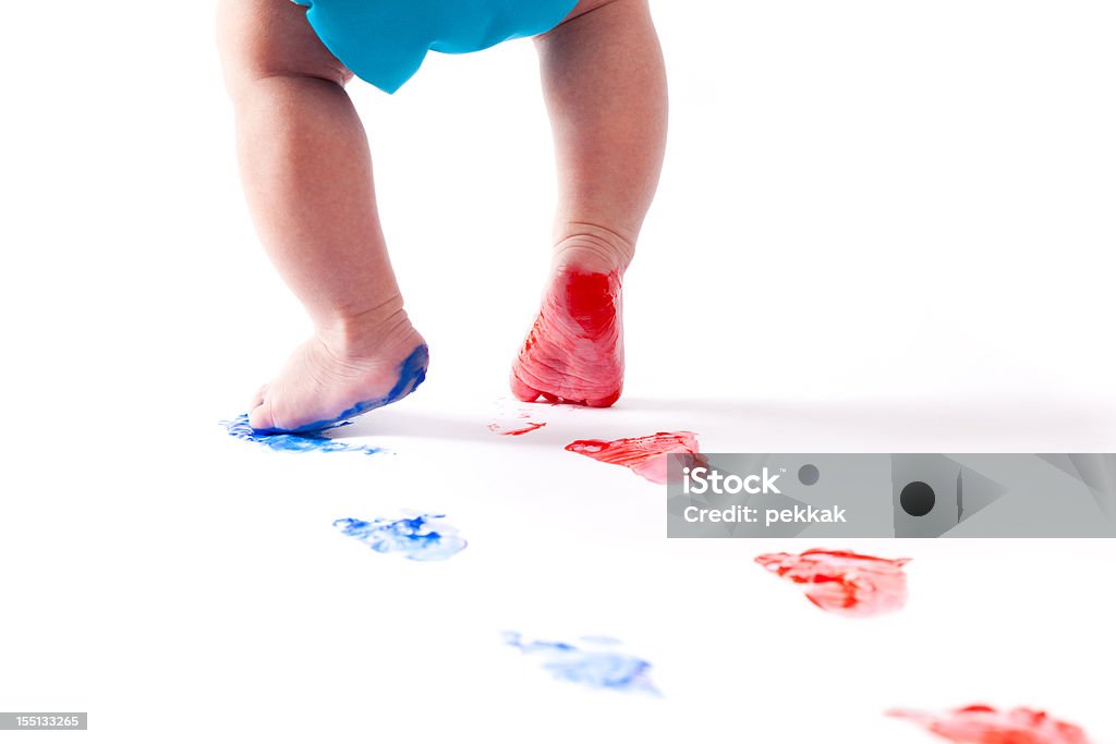 Bébé pieds de laisser des empreintes de bleu et rouge - Photo de Empreinte de pas libre de droits