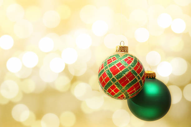 istock Red and green baubles on golden background 155133971