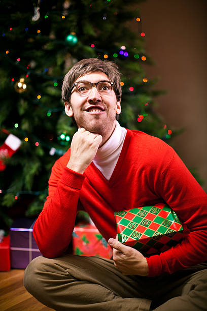 Nerdy Christmas Portrait  christmas ugliness sweater nerd stock pictures, royalty-free photos & images