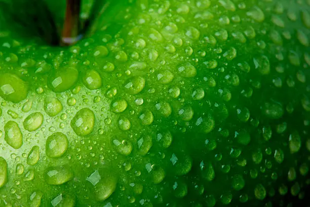 Waterdrop on Green Apple. 