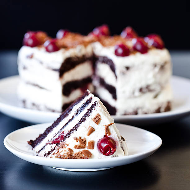 Traditional German cake with cherry and whipped cream.
