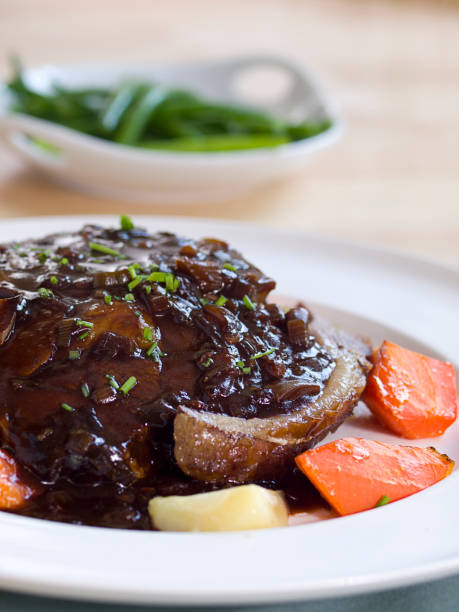 istock meal of roast beef and vegetables 155135688
